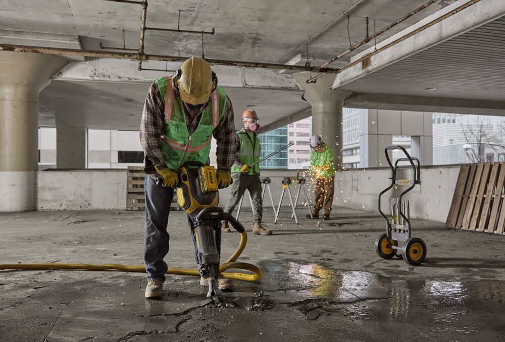 20V MAX* demo hammer chipping into concrete floor 