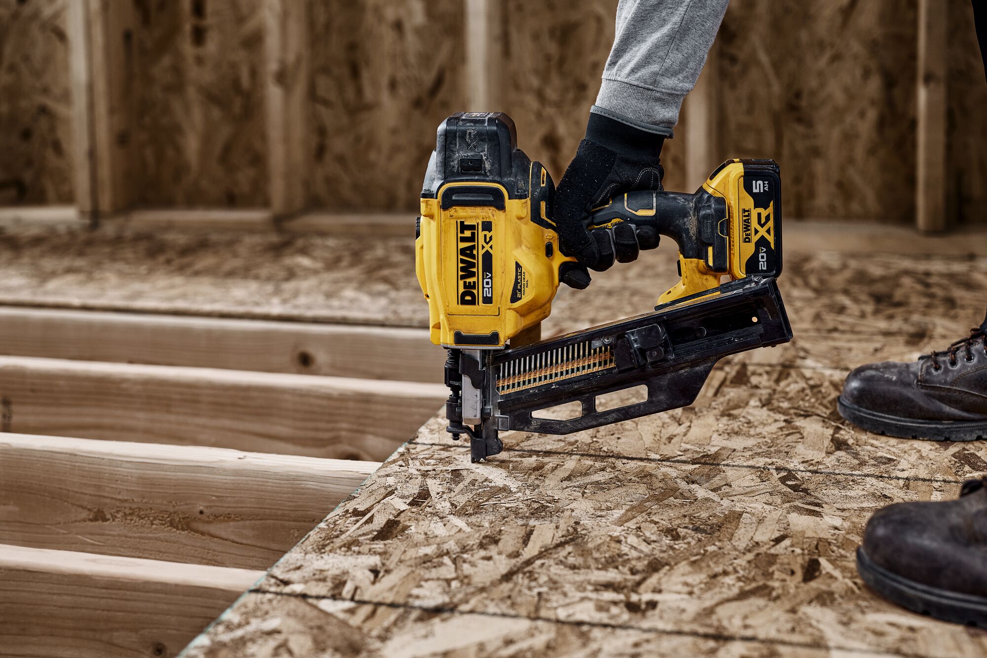 DEWALT 20V MAX* XR 21 Gauge Framing Nailer installing subfloor panels