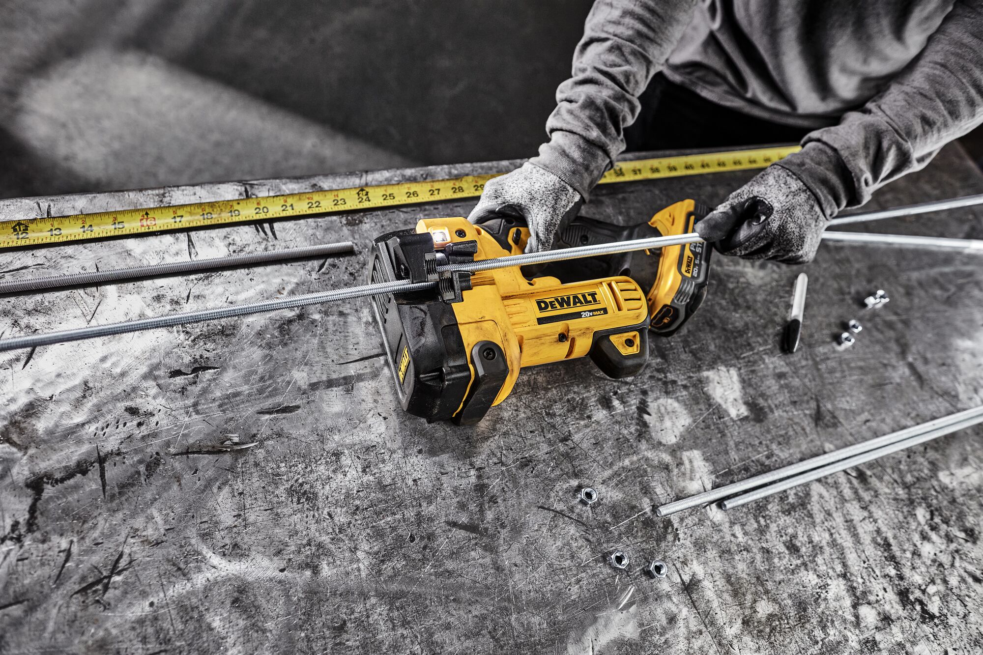 DEWALT Threaded Rod Cutter is used in a pre fabrication shop to cut threaded rod.