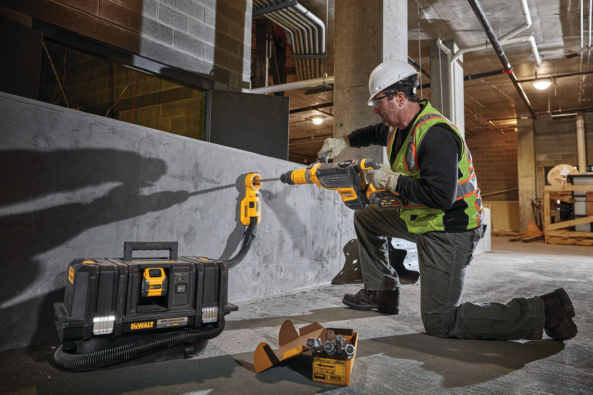Cordless Dust Extractor being used by a workman.
