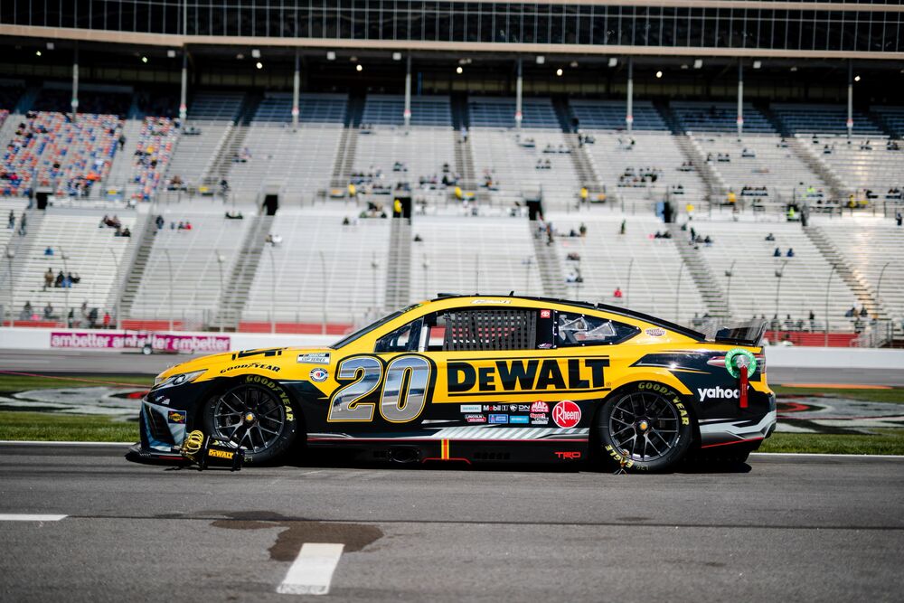 Shot of DEWALT number 20 car with JGR Racing  on a race track 