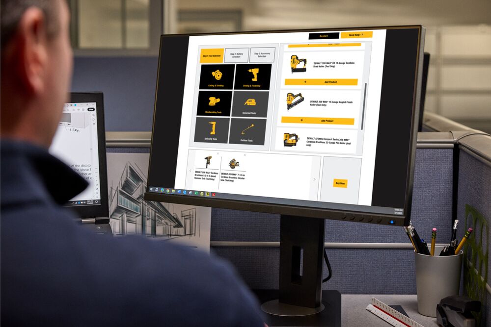 A carpenter uses the DEWALT Cordless Configurator on desktop