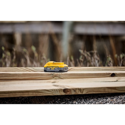 DCBP520 XR POWERSTACK™ 5 Ah battery outside environment shot